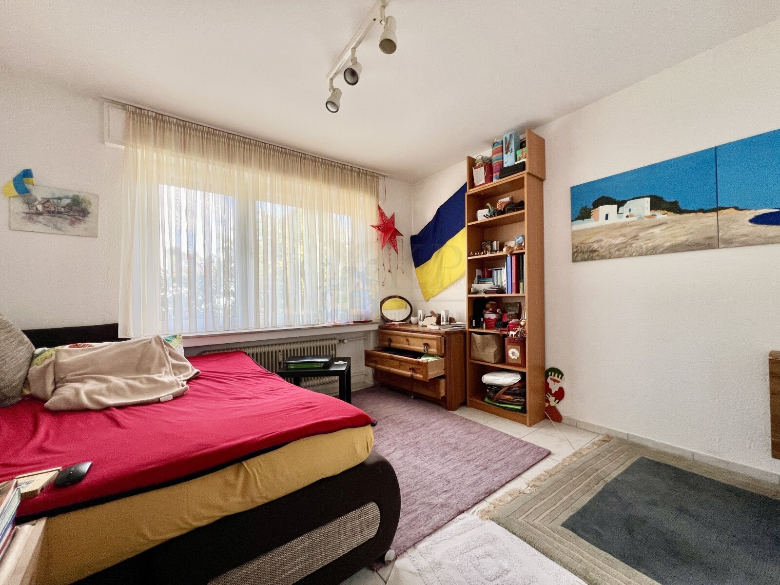 BURGALTENDORF: SPACIOUS CONDOMINIUM WITH 5 ROOMS, GARAGE, GARDEN AND BASEMENT