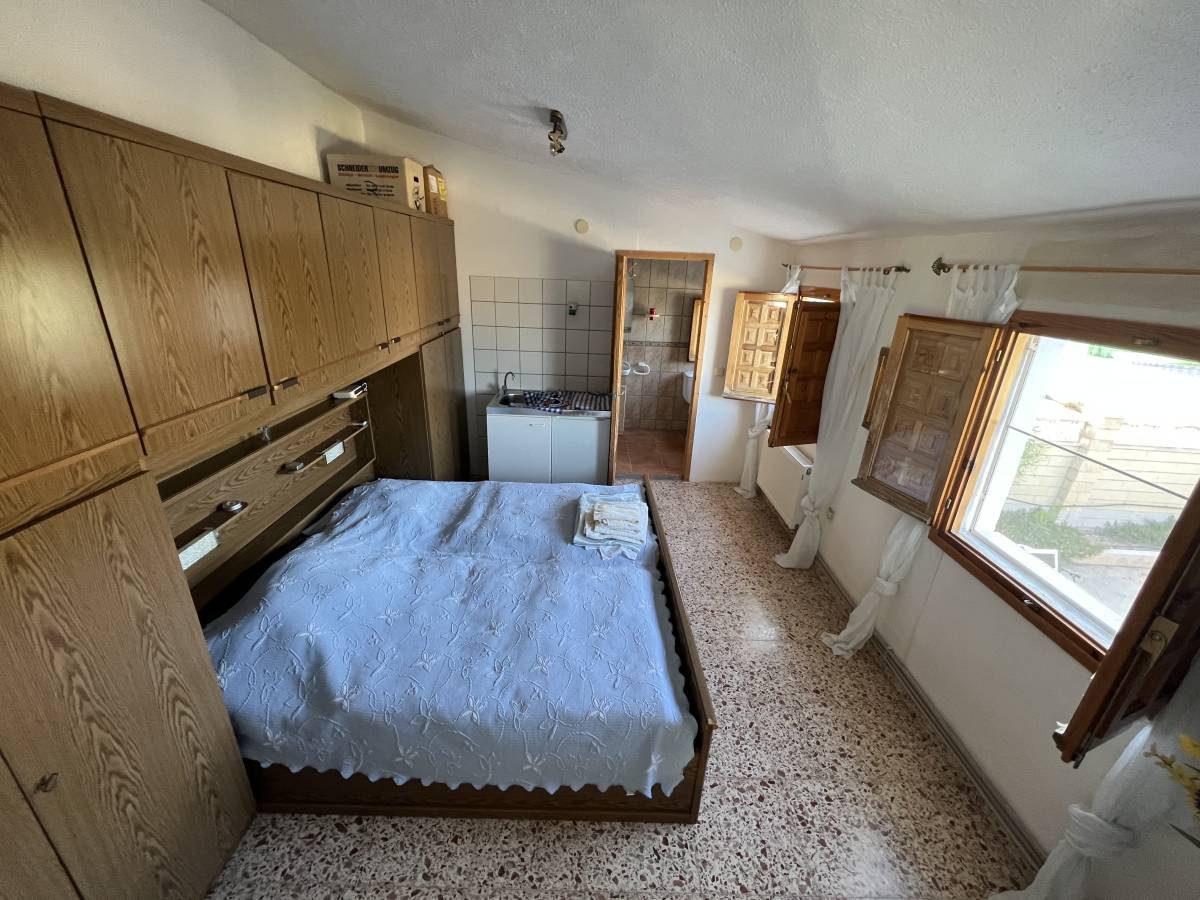 Detached house for sale just 3 km to the town of Castalla, with 221 m² built (approx. 200 m² usable).It features 3 spacious bedrooms with two bathr...