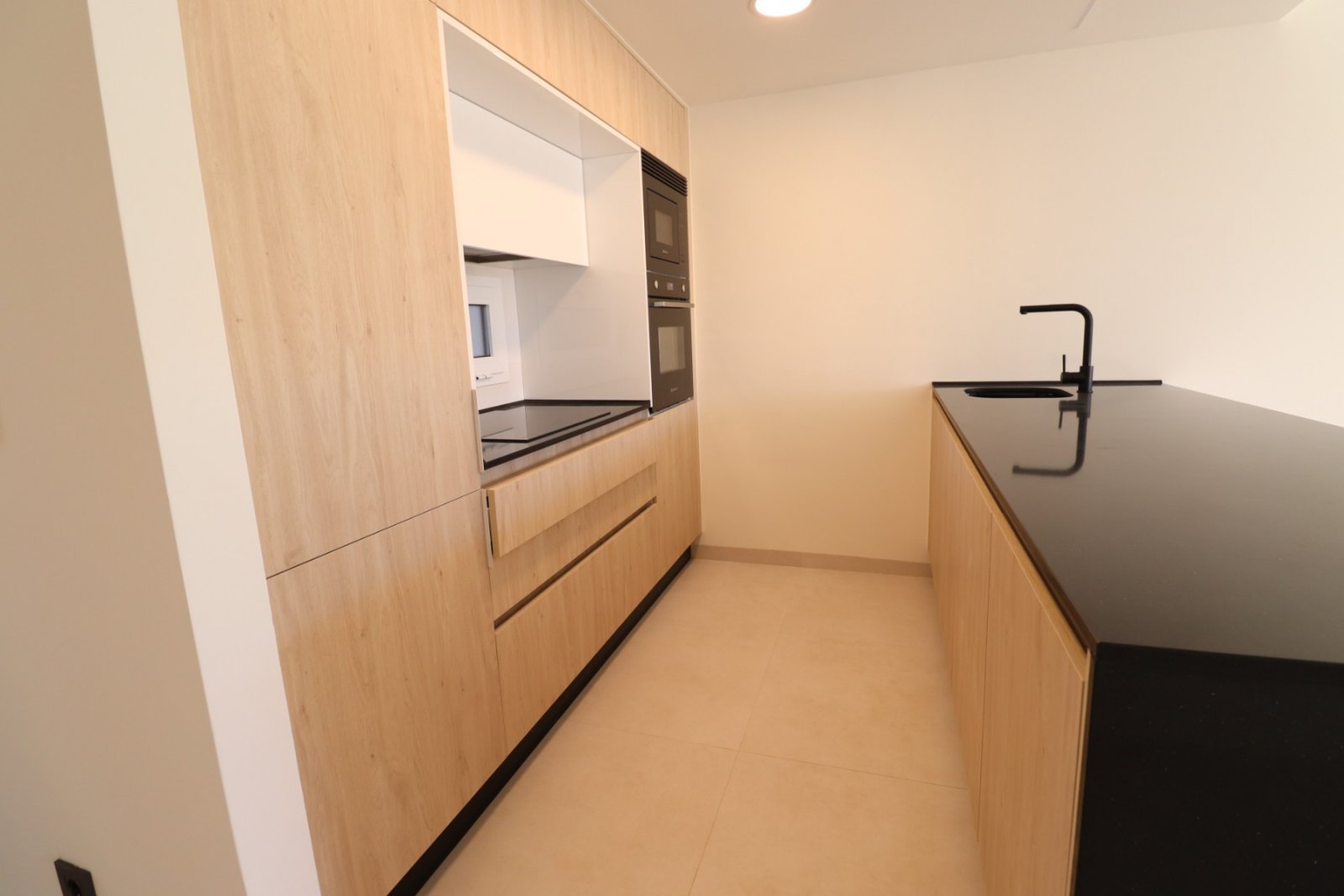   This South Facing Two Bedroom Ground Floor Apartment in Benijofar, is located in a desirable and modern residential area, just a five-minute driv...