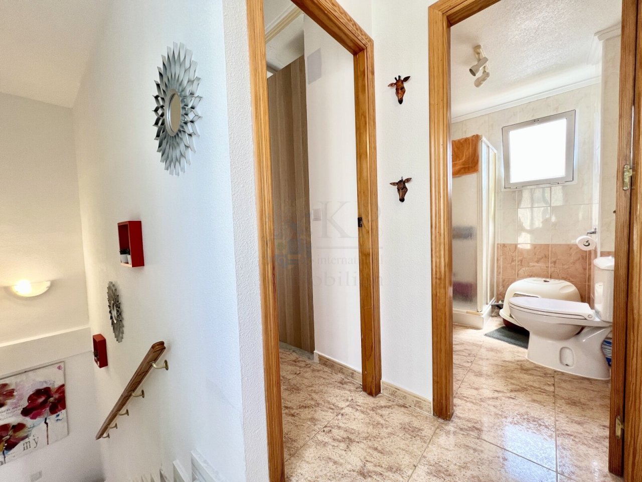 HALLWAY ON THE UPPER FLOOR