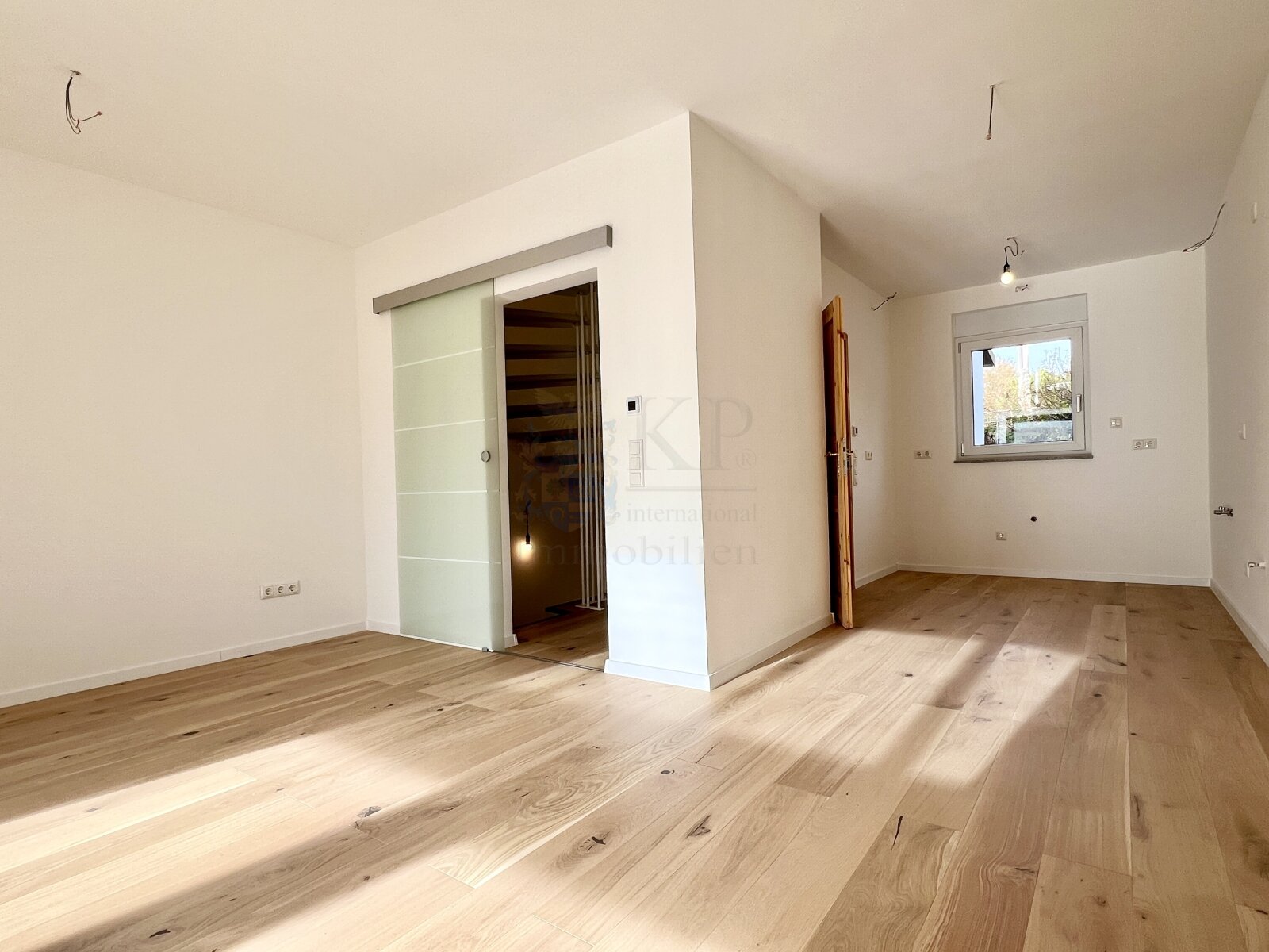 BRIGHT LIVING-DINING ROOM ADJACENT TO THE KITCHEN